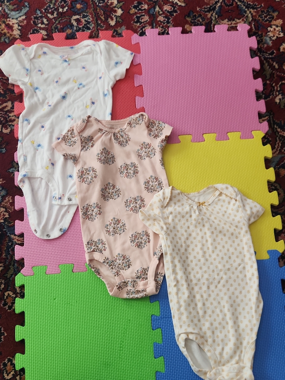 Carter's Short-Sleeve One-Piece Bodysuits in White, Pink, and Cream